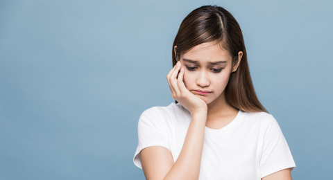 girl looking sad