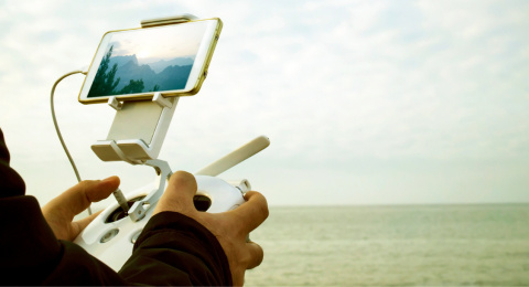 person operating a drone