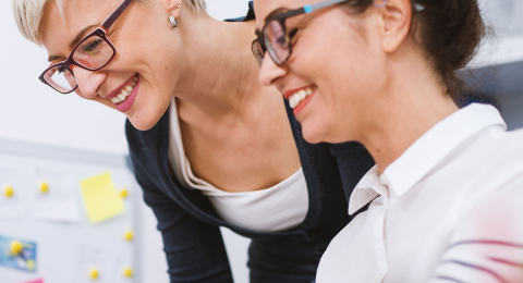 two women working on lean concepts