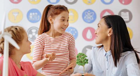 kids talking with teacher