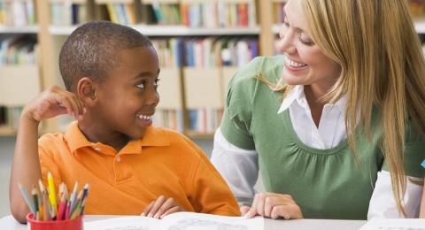 reading instruction, teacher with boy