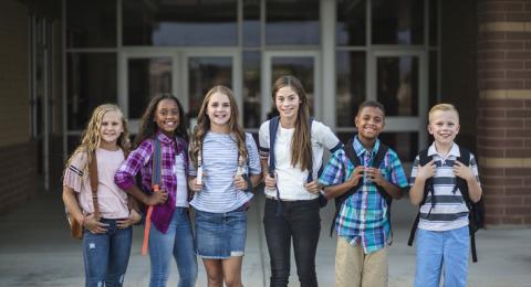 Students in front of school
