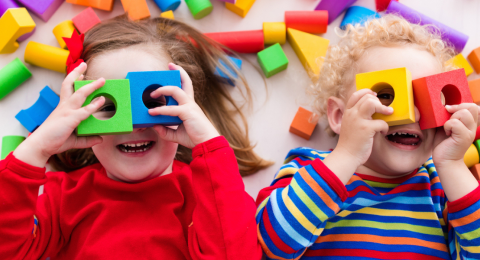 Children playing with colorful blocks