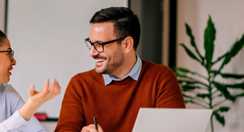 business woman and man in positive interview