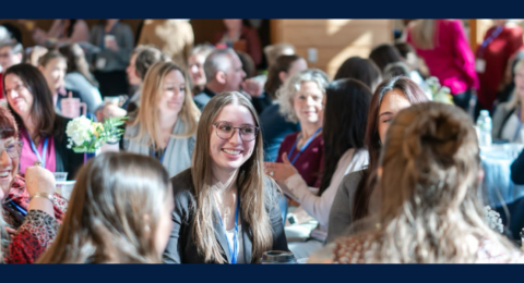 woman at conference and keynote speaker headshot