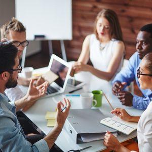 Team communicating at conference table