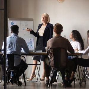 Woman leading team meeting