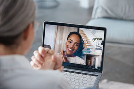 Video meeting on a laptop