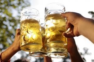 People toasting glasses of beer