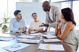 four workers making a plan