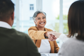 female hr professional shaking hands