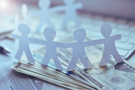 paper figures holding hands
