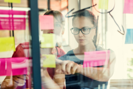 woman planning at board