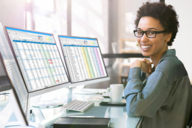 woman at double monitors