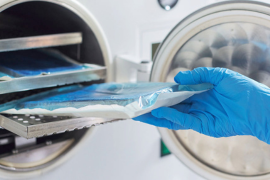 hands sterilizing medical equipment